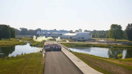 Outdoor group photo in front of SEED Campus training building