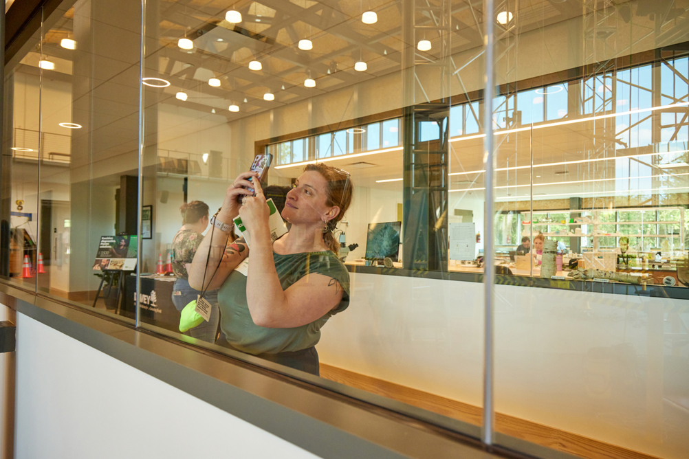 Davey employees take photos of spaces at new SEED Campus