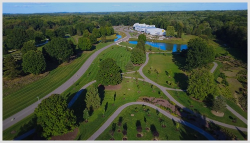 Aerial view of the arboretum, ponds and building at the SEED Campus