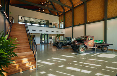 SEED Campus lobby with restored vehicles