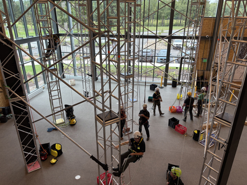 Trainees using the climbing center at Davey's SEED Campus